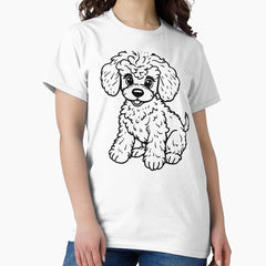 A cute poodle with curly fur and a bow on its head playing with a ball. Classic T-Shirt