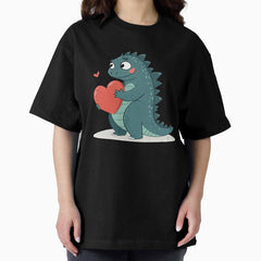 A Cute Cartoon Dinosaur Character Holding A Red Heart Oversized T Shirt