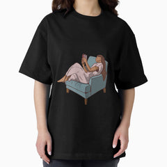 A Woman Reading A Book On The Blue Couch Oversized T Shirt